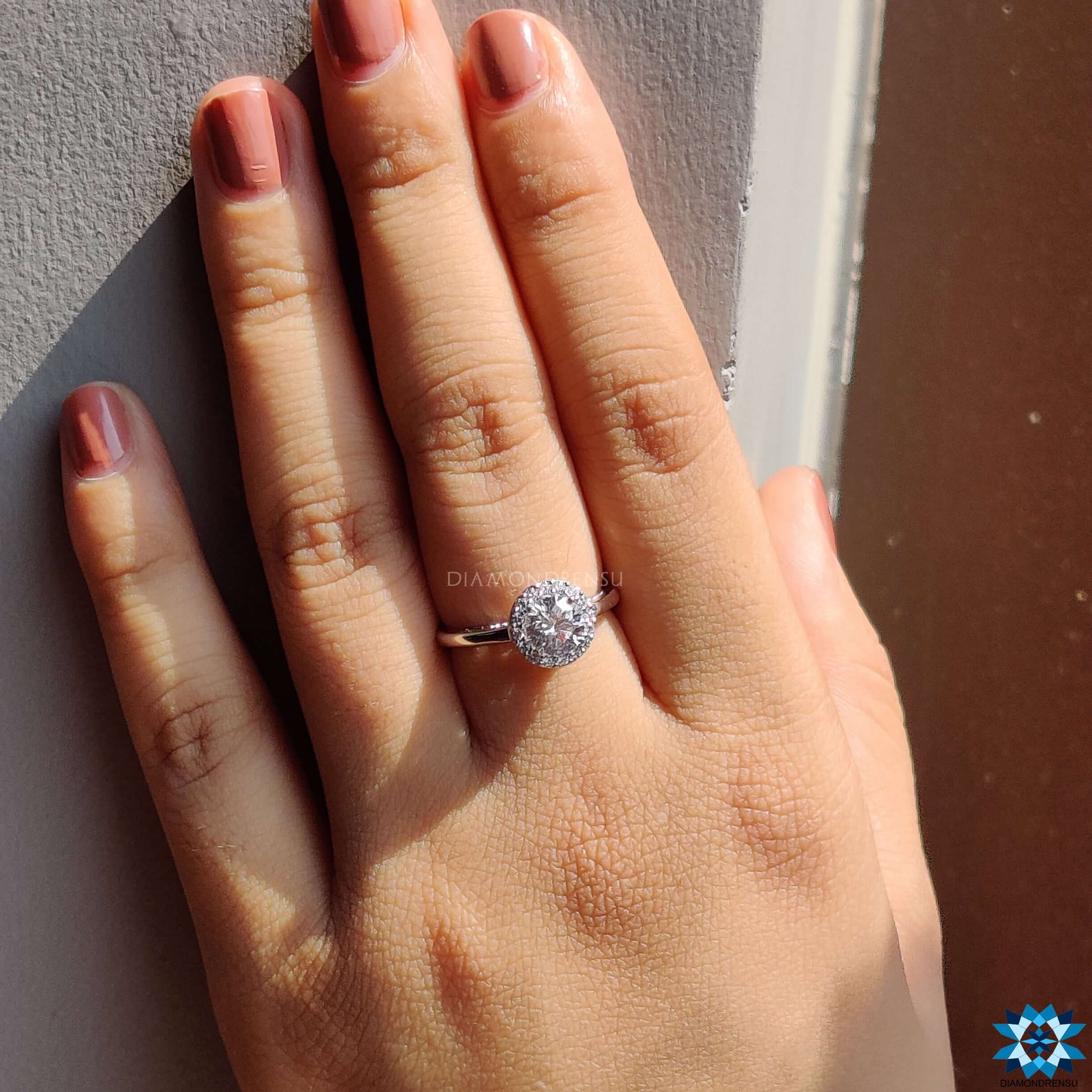 Moissanite for engagement ring set in a beautiful halo engagement ring.