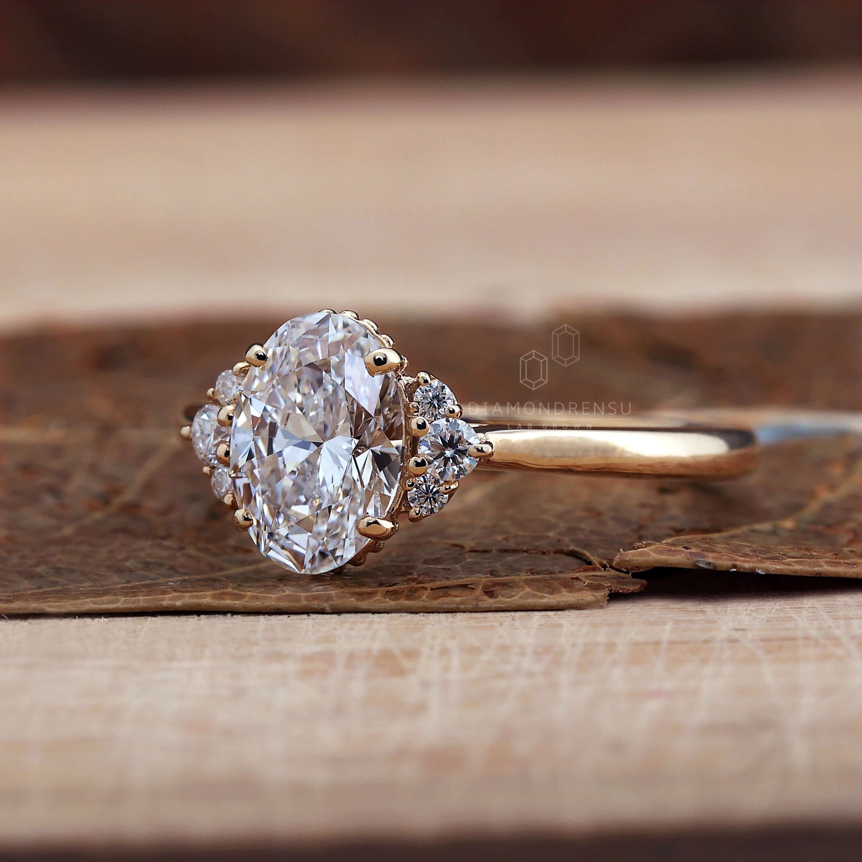 Oval ring with a 4 prong round diamond engagement ring style for a classic and secure look.