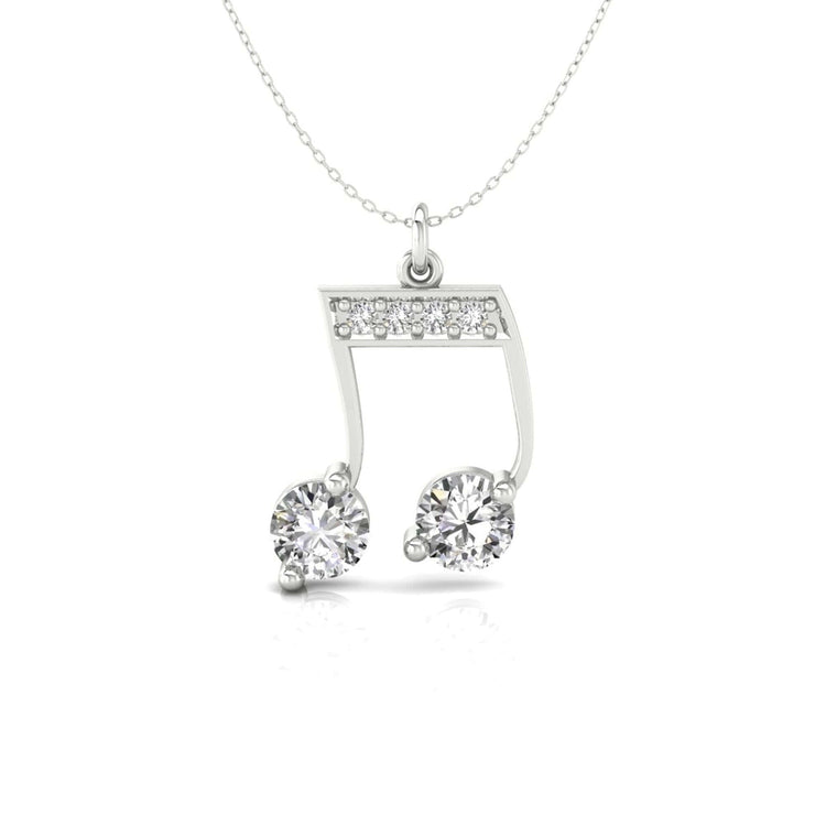 UK diamond pendant paired with music note gold pendant.
