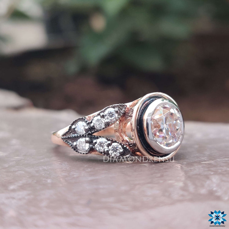 Round cut moissanite ring in a classic prong setting.
