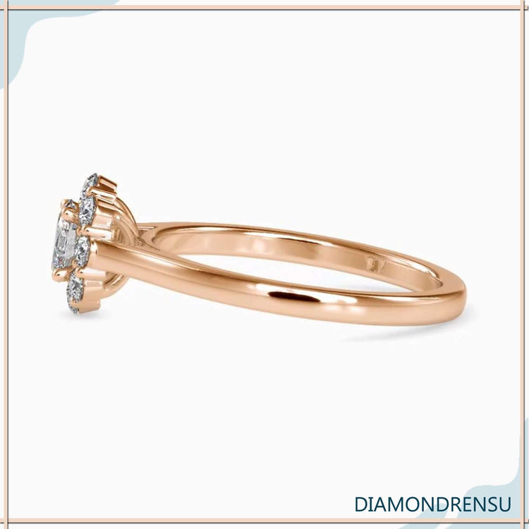 Custom engagement ring with oval cluster and cathedral shank.
