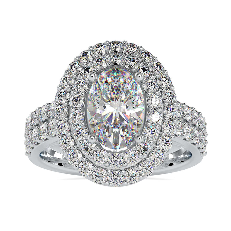 UK engagement ring featuring double halo oval and lab diamond.
