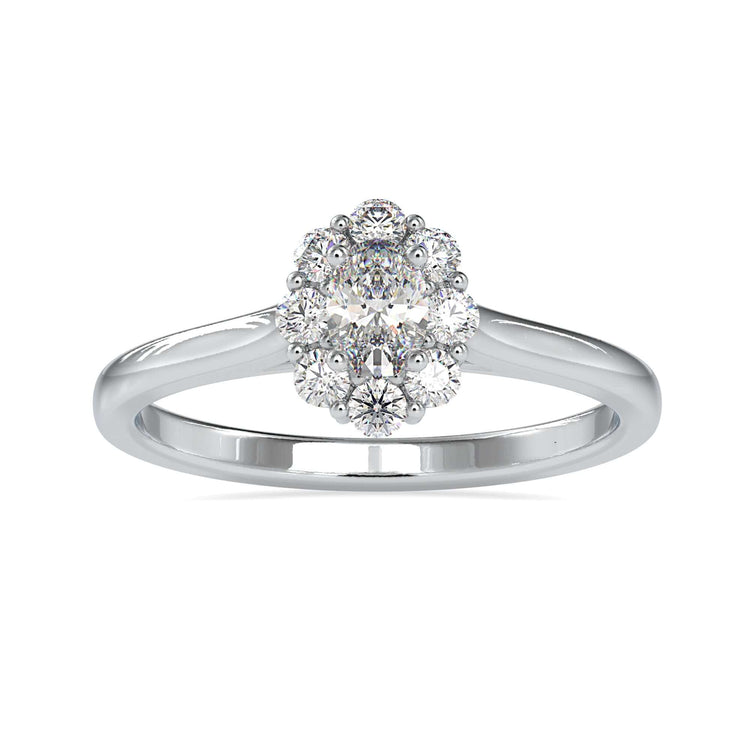Oval diamond centre ring with round side stones in rose gold.
