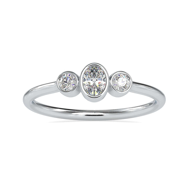 Custom engagement ring featuring three stones in white gold setting.
