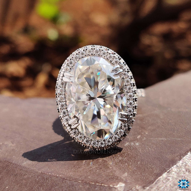 Oval engagement ring with hidden accent stones.
