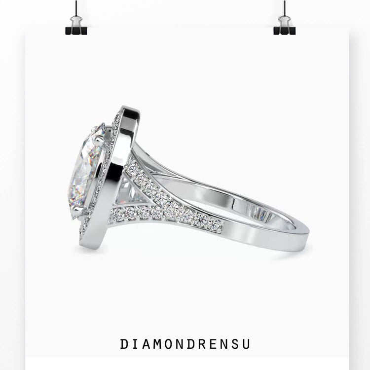 Yellow gold diamond ring with round prong setting.
