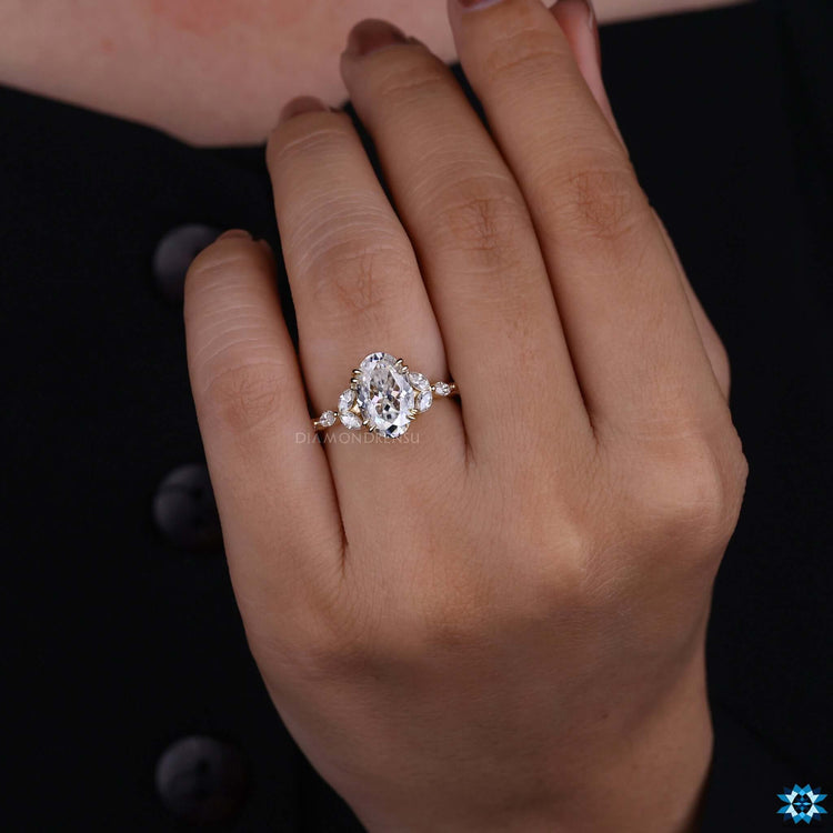 Rensu cut moissanite ring with double claw prong and handcrafted finish.
