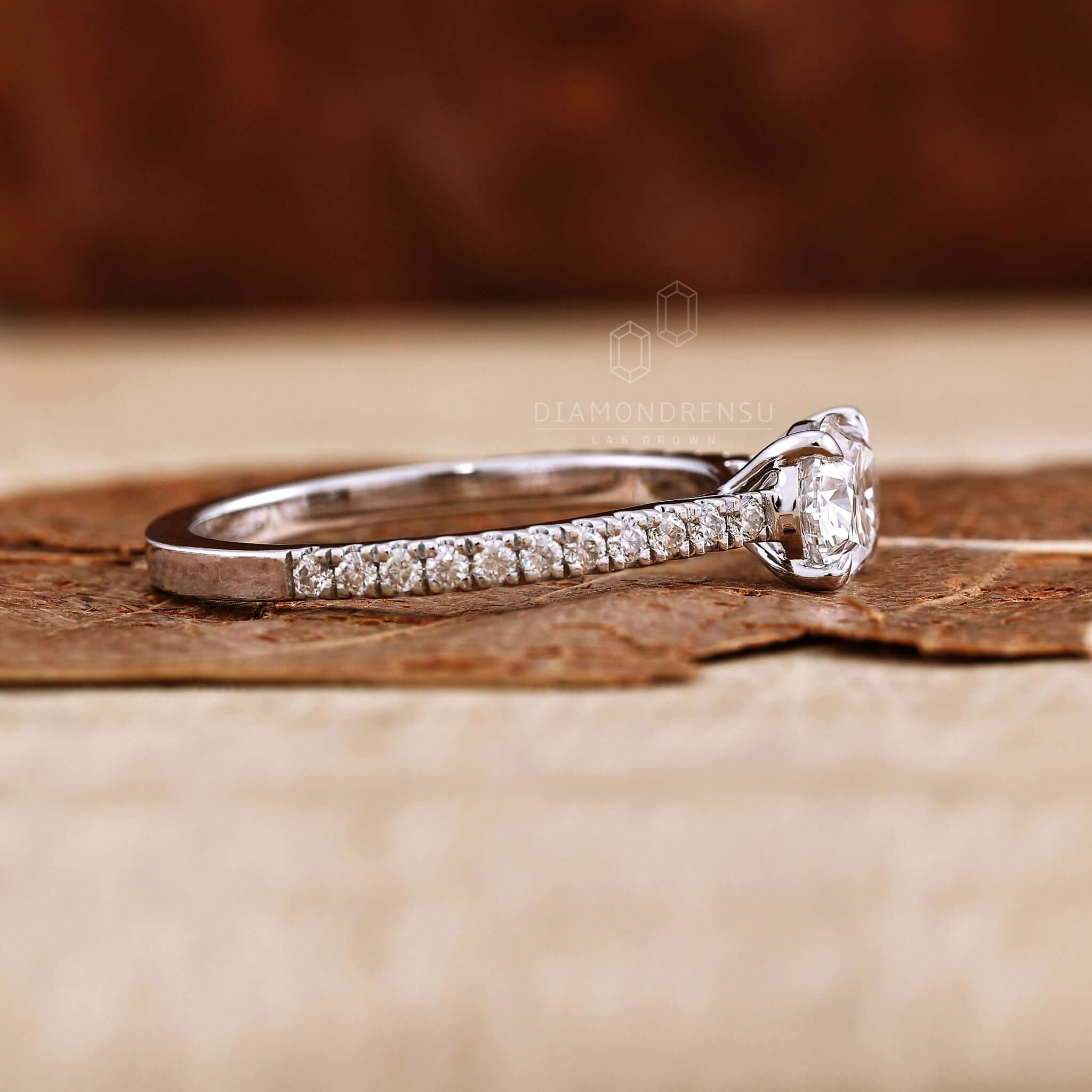 East to west oval diamond ring in a 4 prong claw setting
