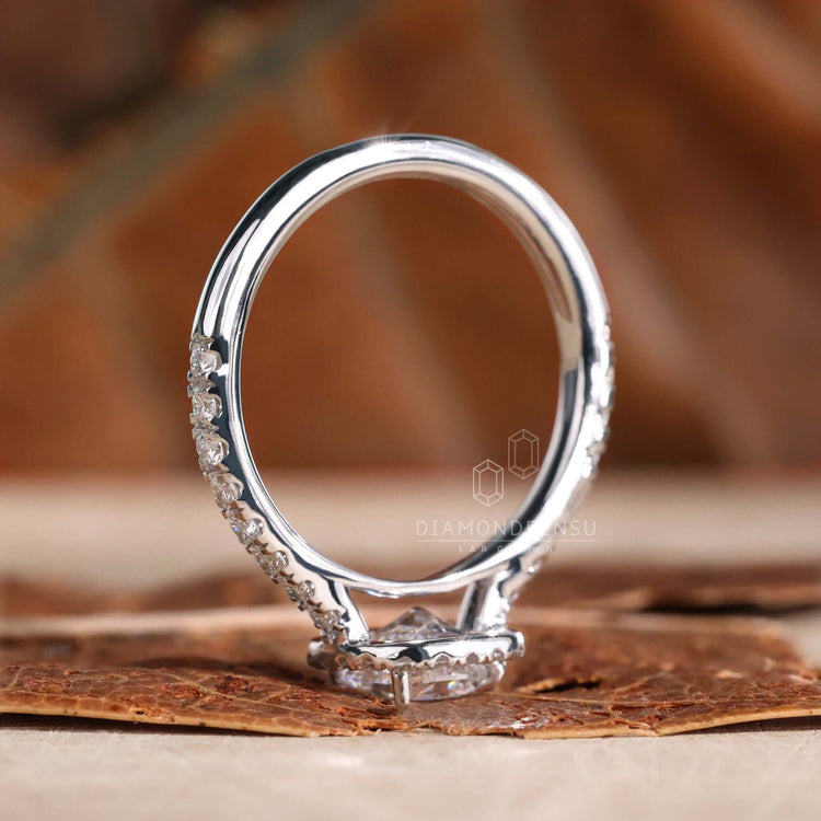 Elongated cushion cut diamond in a stunning cathedral ring setting

