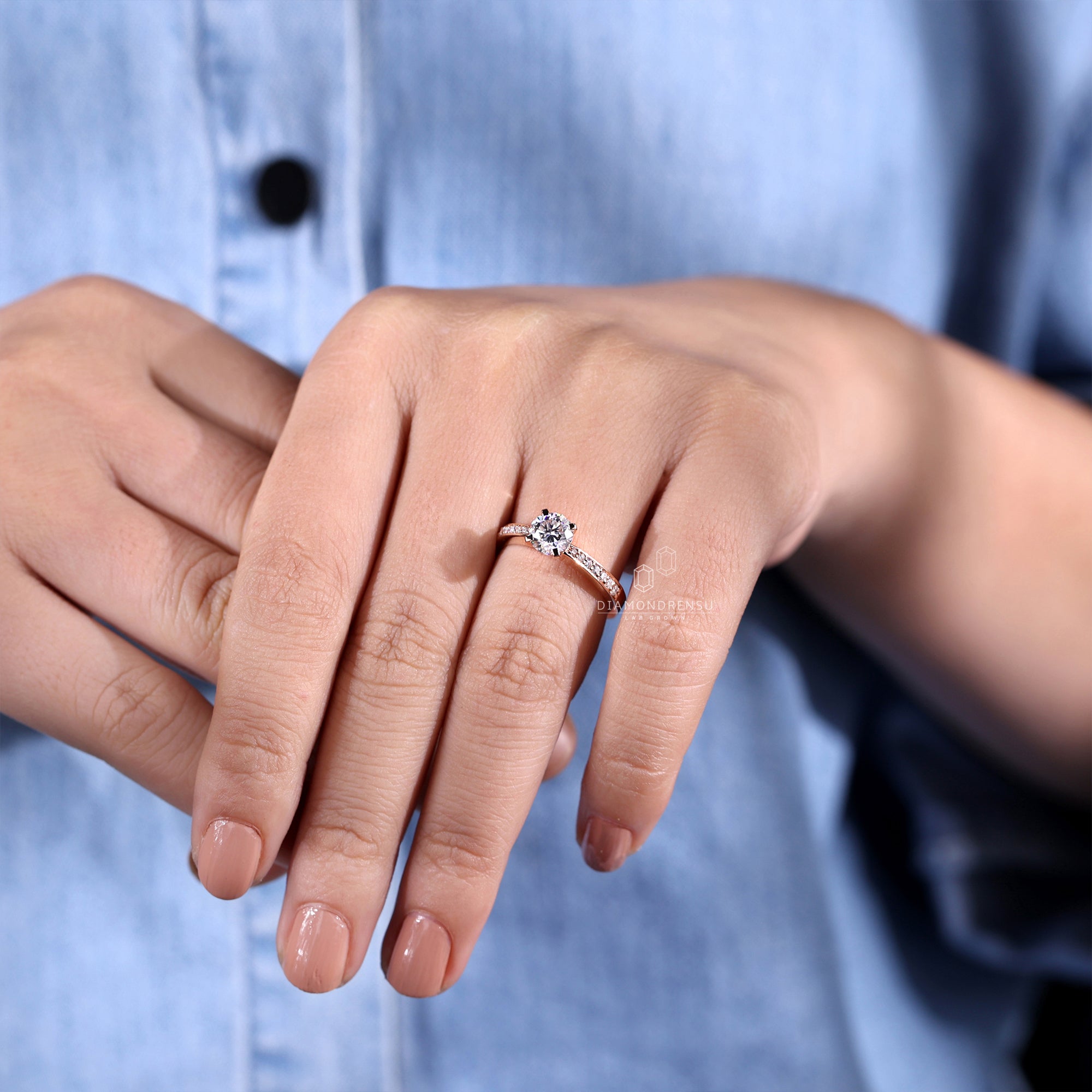 Round pave engagement ring with IGI certified lab grown diamond.