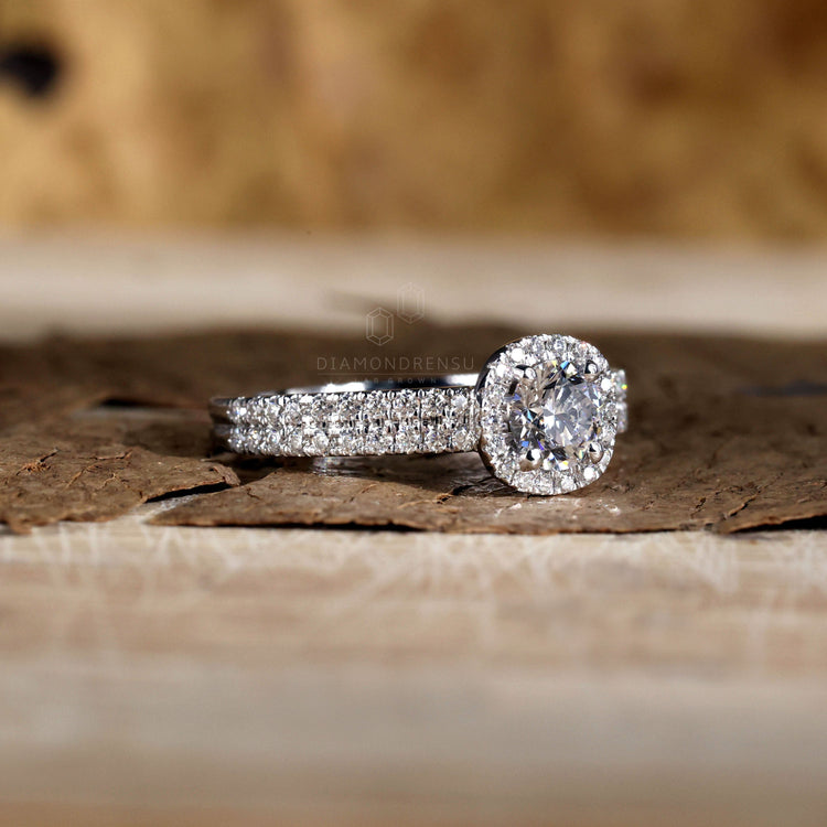 White gold engagement ring with a round brilliant cut diamond.
