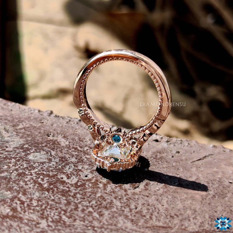Two tone rose and white gold moissanite ring.
