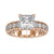 Princess cut engagement ring with sparkling diamonds in a pave setting.
