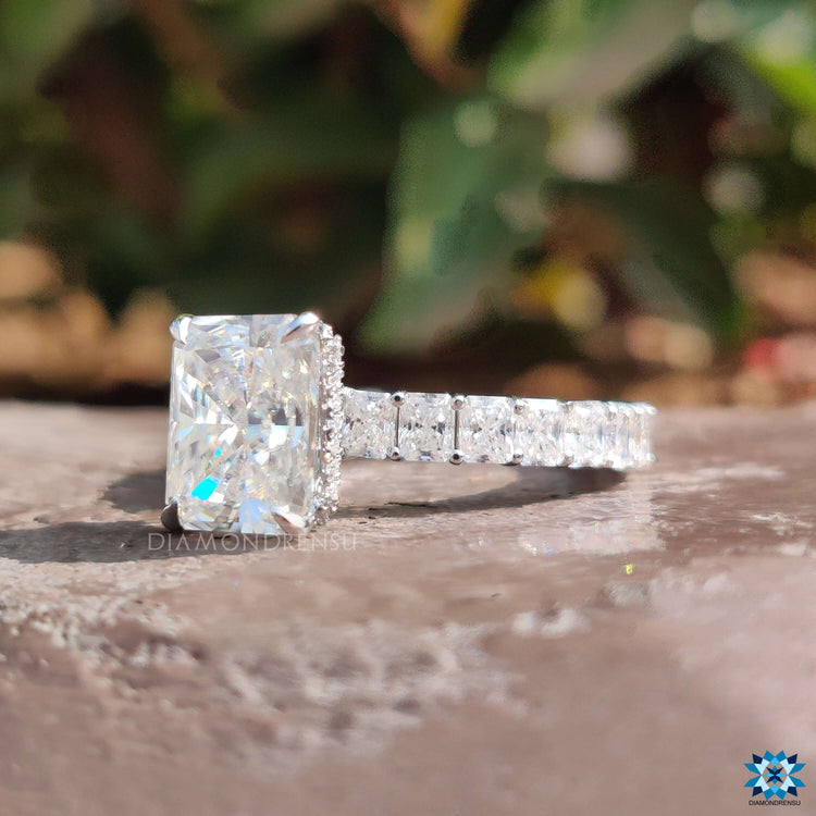 Radiant cut moissanite ring with 4 prong claw setting.
