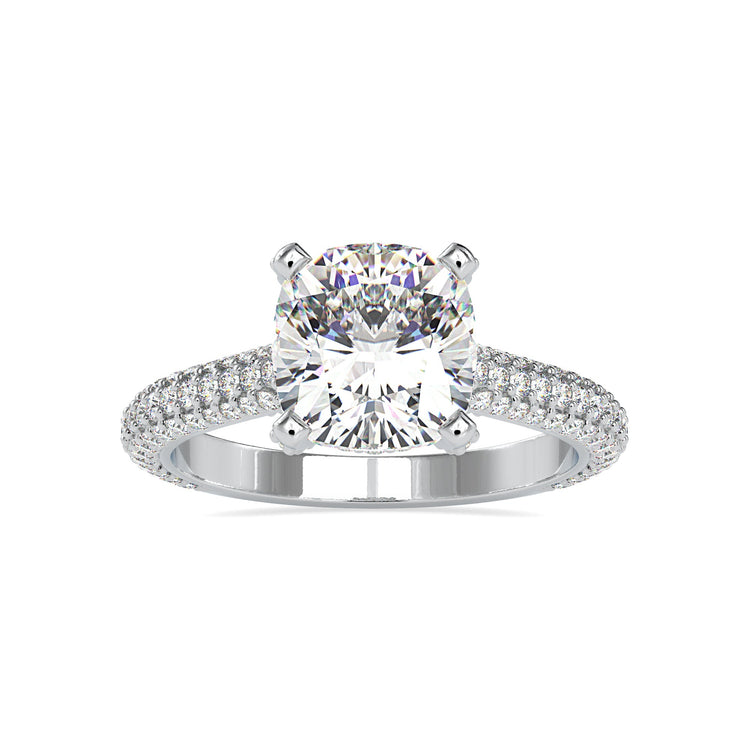 Tab prong setting with round cut pave side stones.
