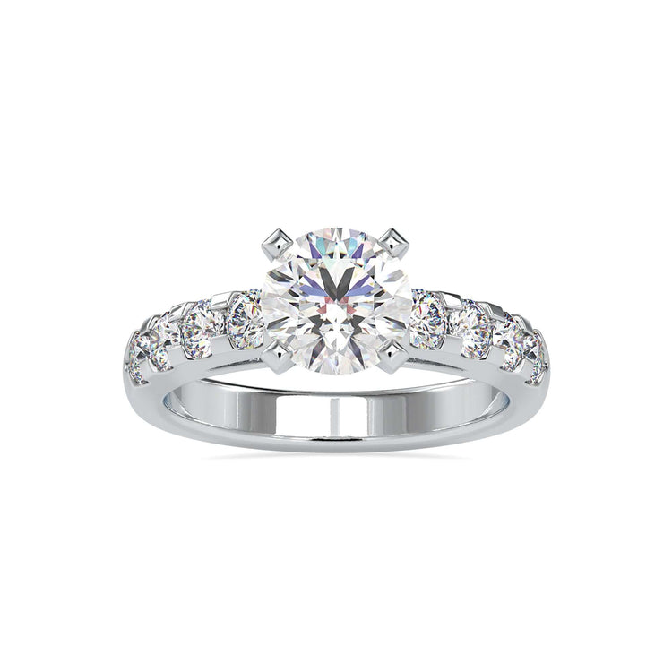 Tab prong setting ring in yellow gold with custom pave band.
