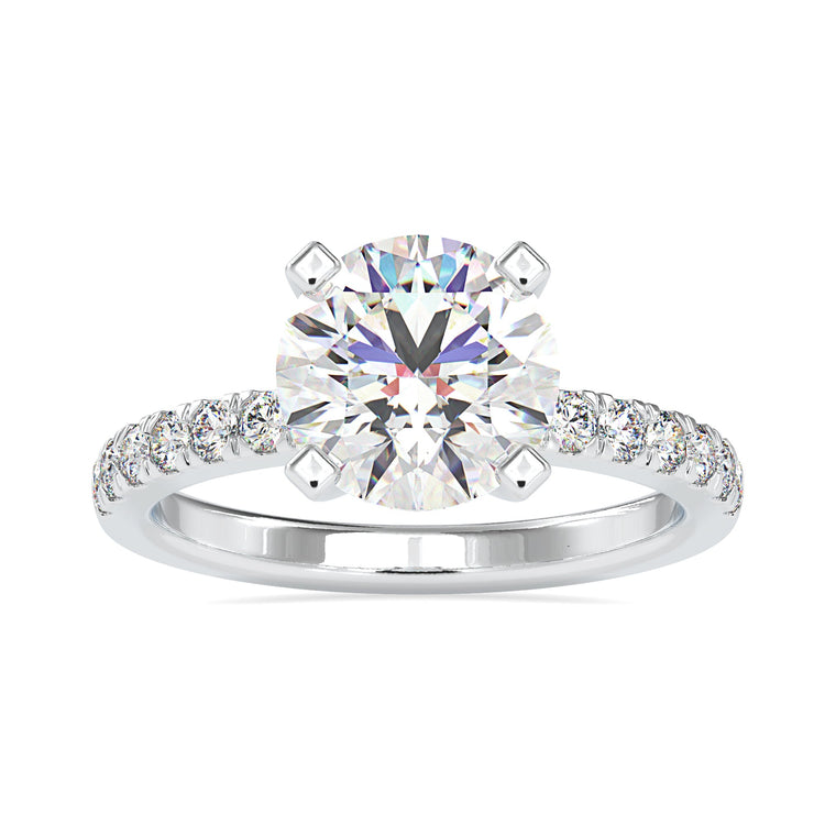 Handmade round diamond ring with pave band.

