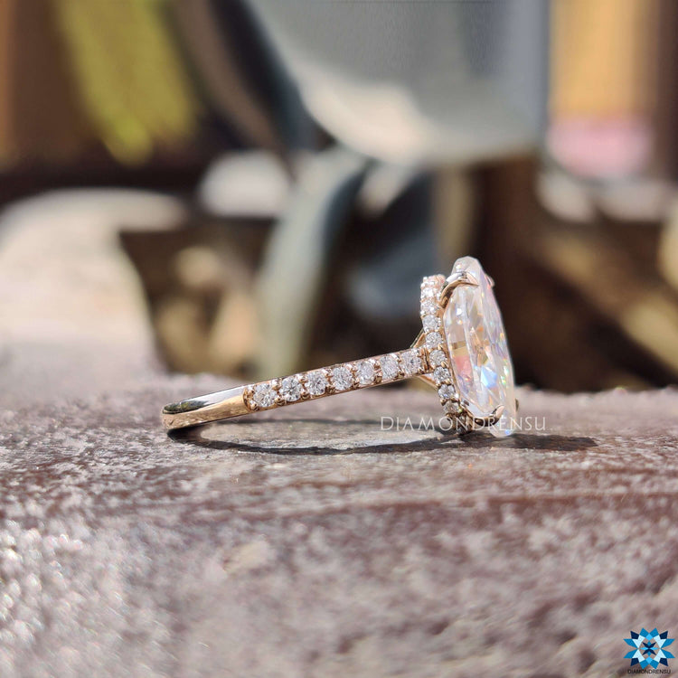 Moissanite pave ring with round cut stones.
