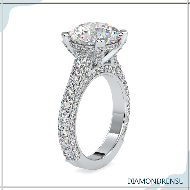 Buy engagement ring with round cut and three row setting.
