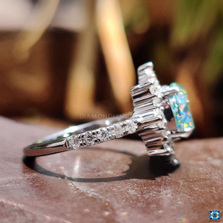 White gold halo engagement ring with Portuguese cut.
