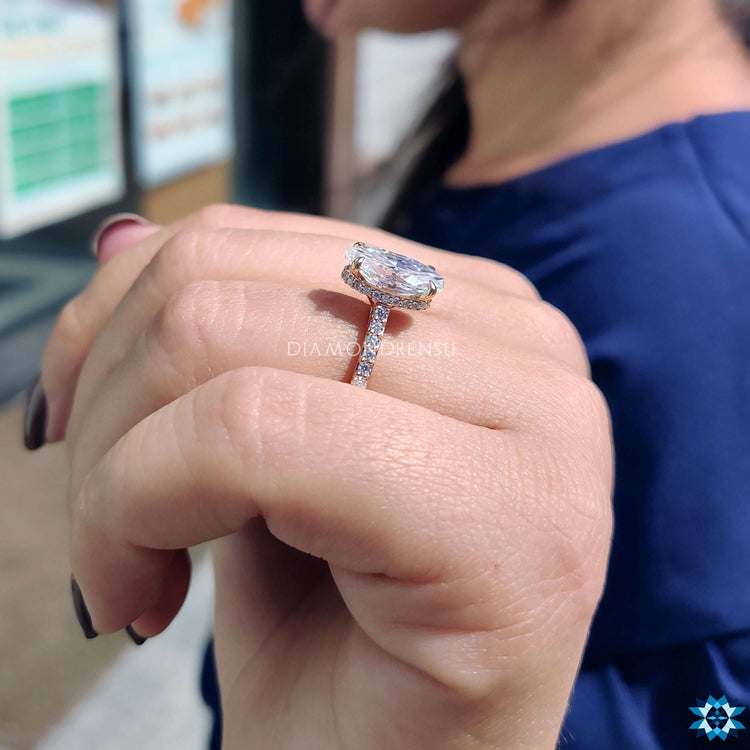 Handmade moissanite engagement ring in rose gold.
