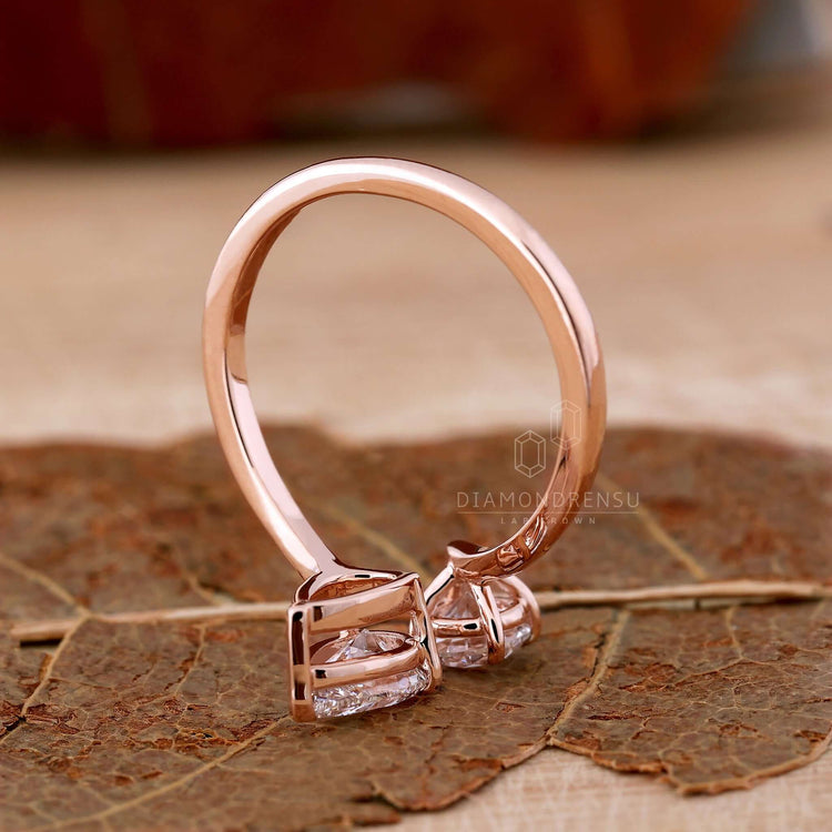 Bypass setting engagement ring designed with two stone engagement ring style for a unique touch.
