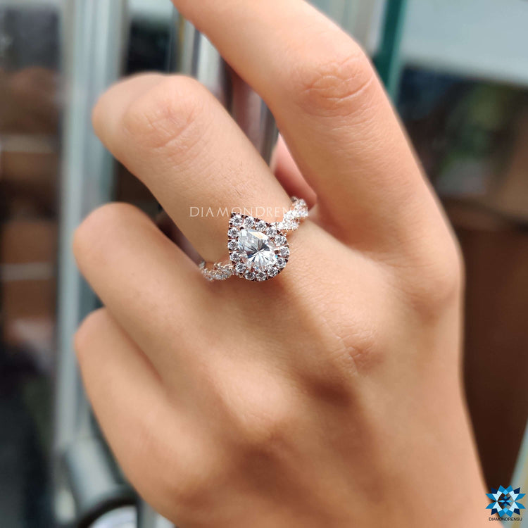 Rose gold engagement ring with twisted pave band.
