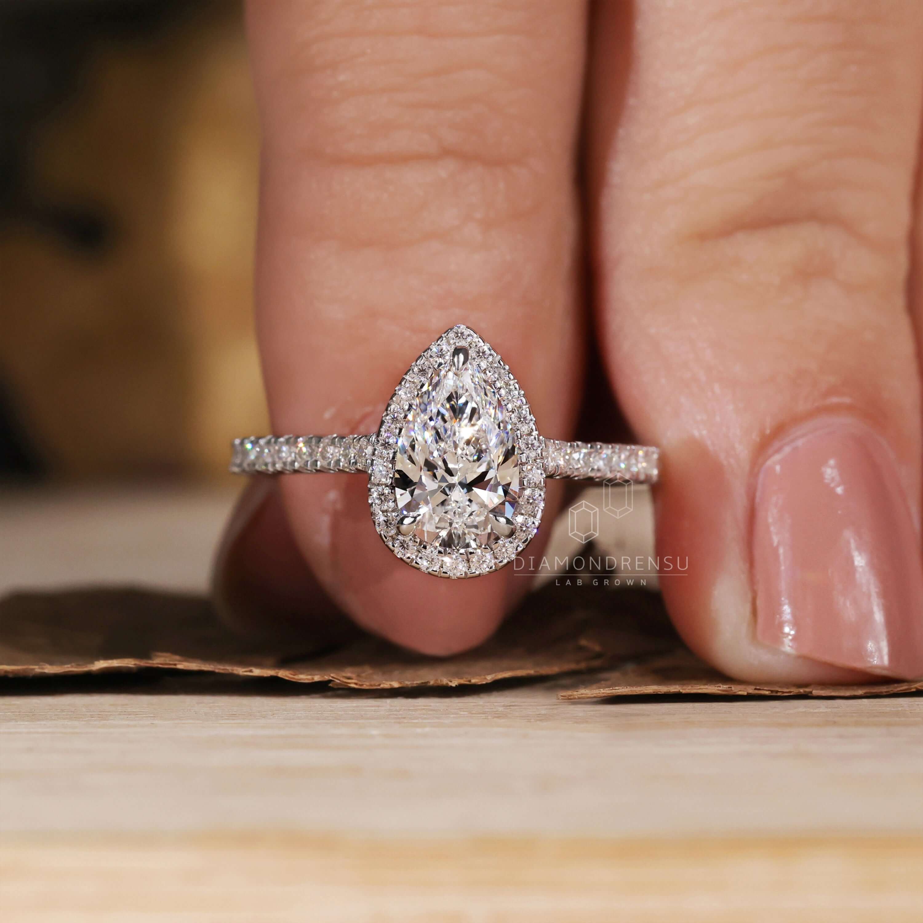 Pear shaped engagement ring gold for a luxurious touch.