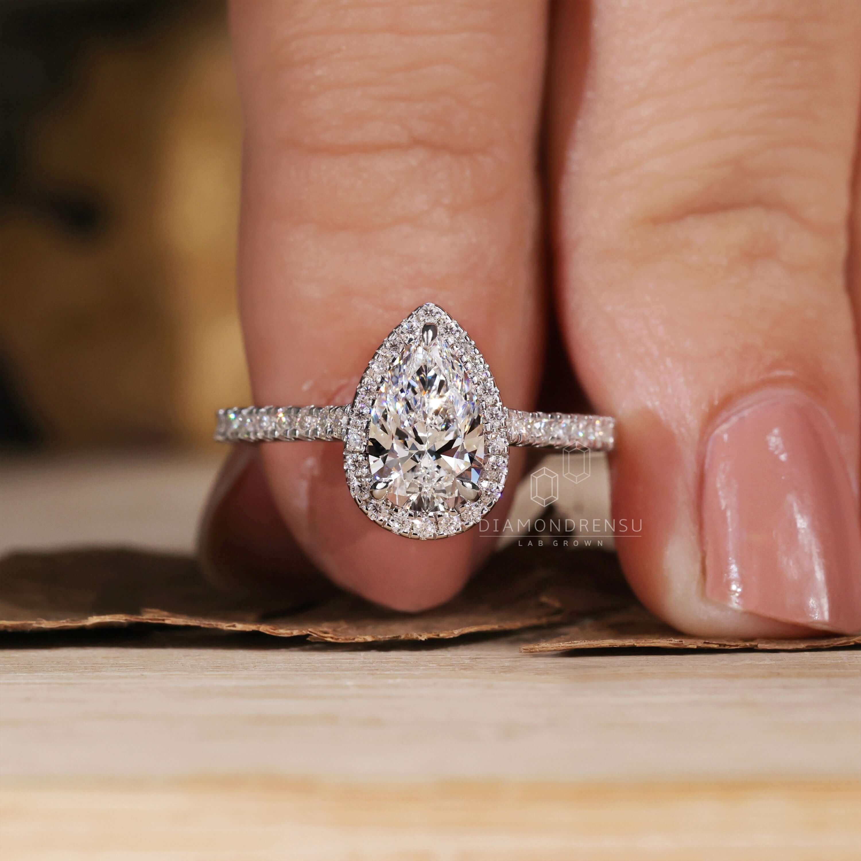 Pear Shaped Engagement Ring with Pave Set Sparkle