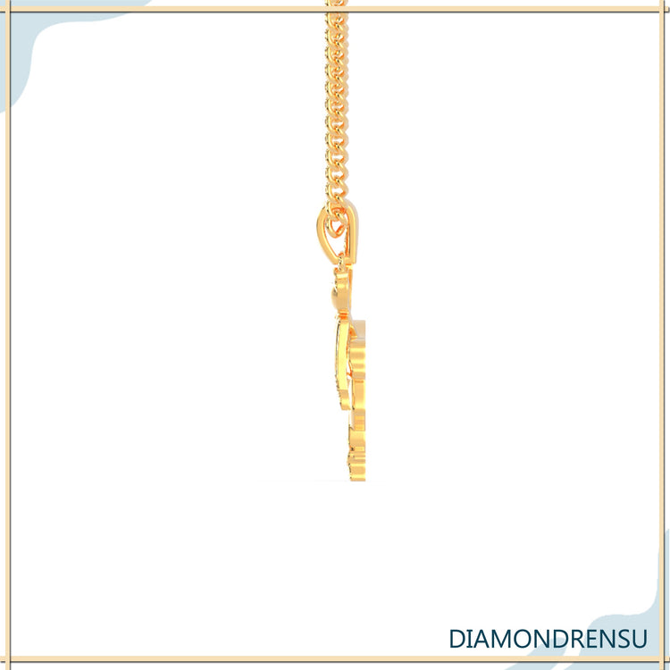 Angel pendant gold with sparkling diamond accents.
