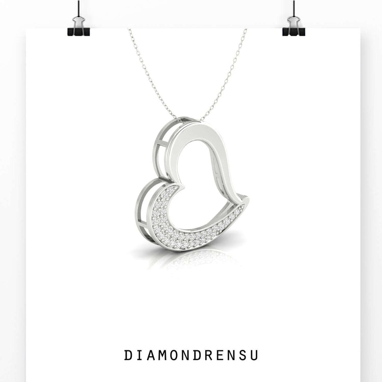 White gold heart pendant with lab grown diamond.
