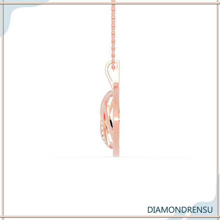 Unique spiral design pendant with white gold and diamond.
