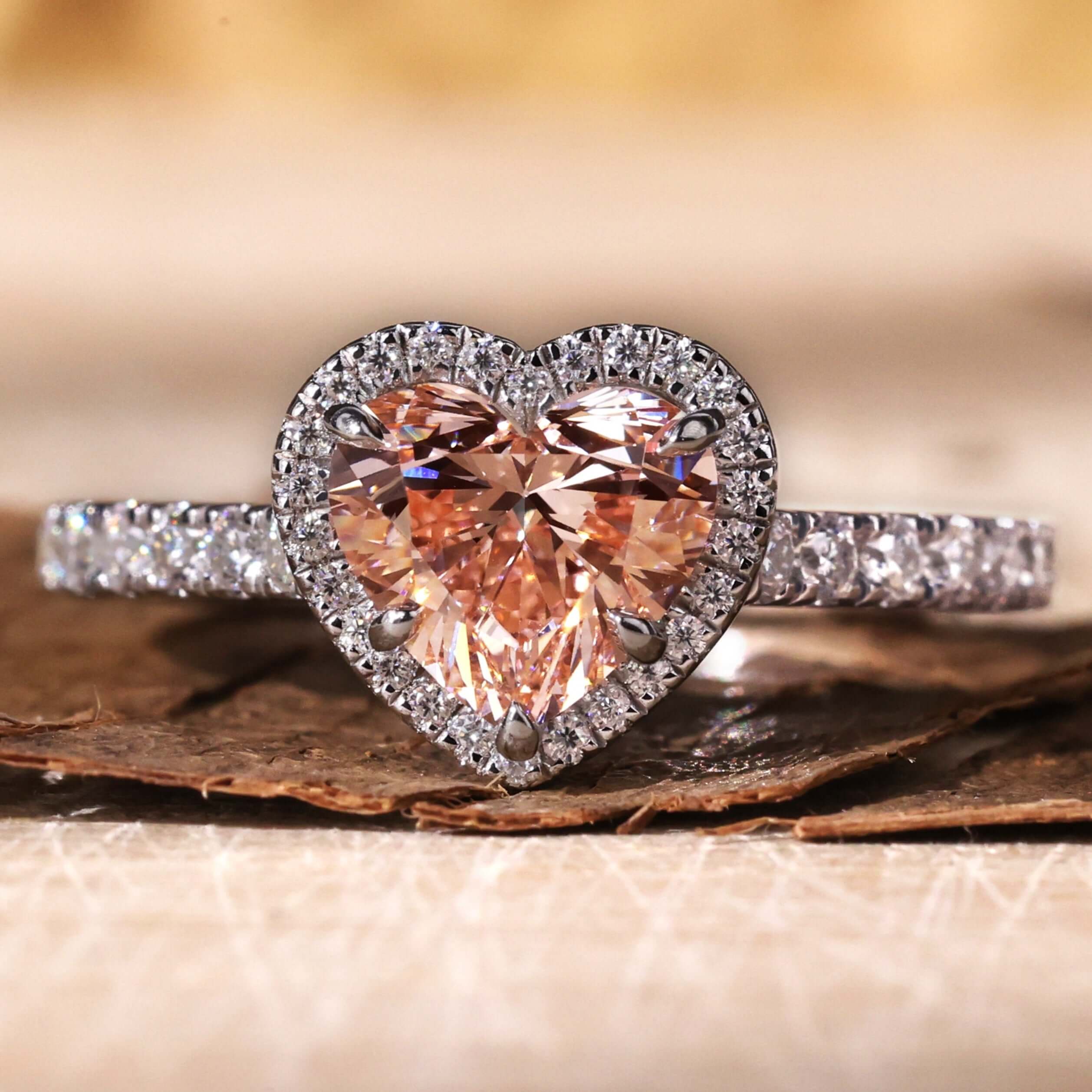 Heart shaped diamond ring with a stunning halo design for elegance
