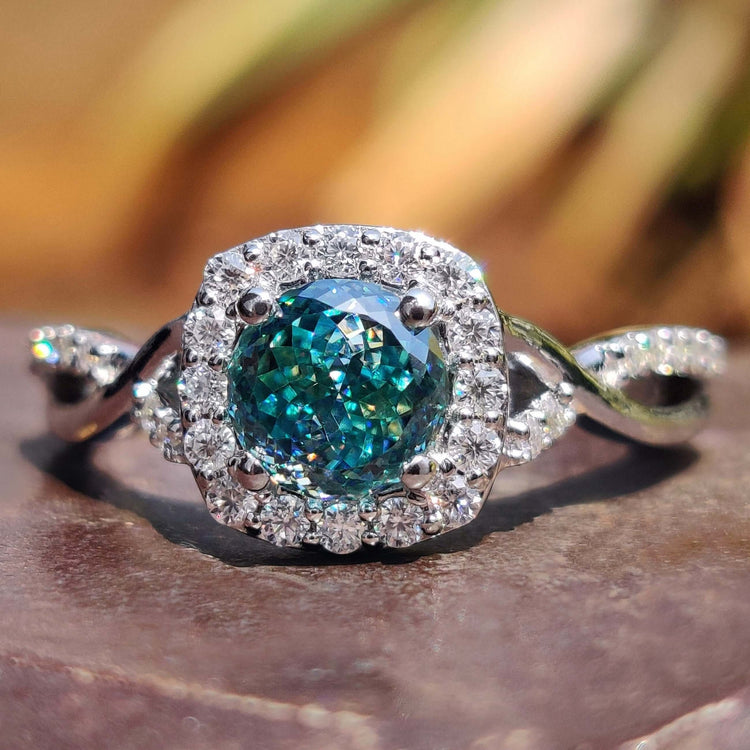 Twisted pave ring with Portuguese cut moissanite.
