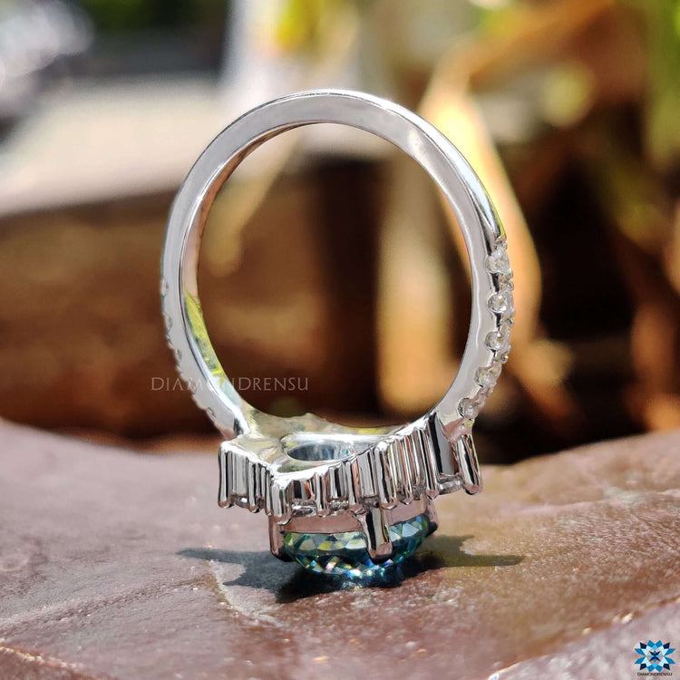 Elegant halo ring with round Portuguese cut stone.
