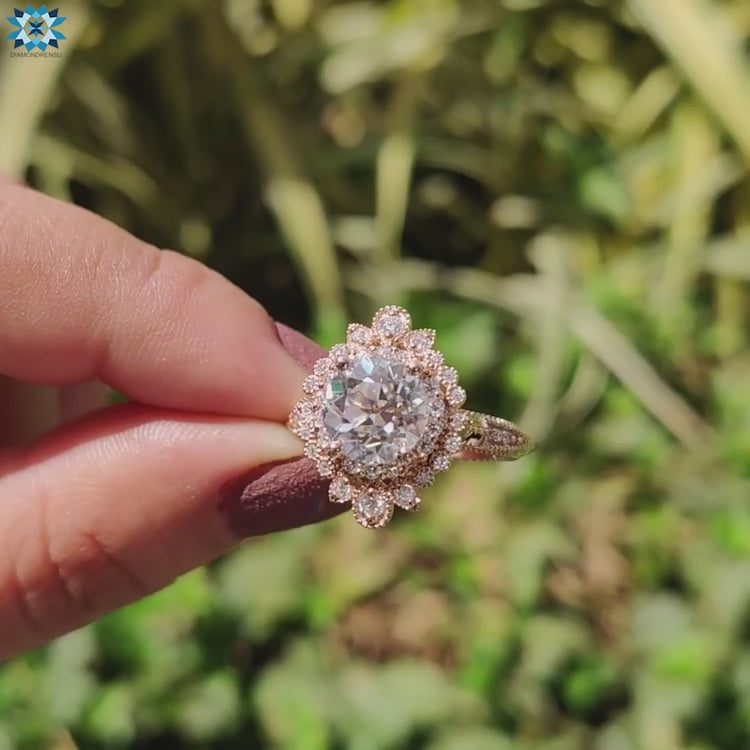 Round old European cut moissanite engagement ring.
