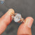 Round Cut engagement ring with twisted pave setting ring
