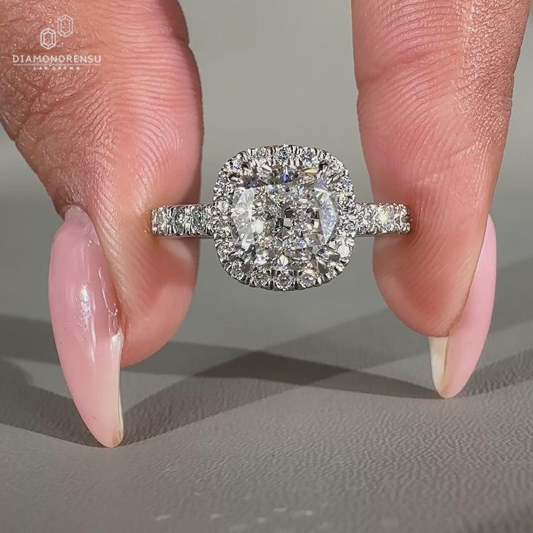 Hidden accents engagement ring in white gold with double claw prong.
