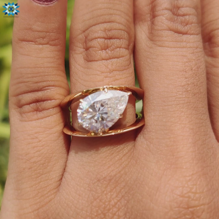 Handmade jewelry ring with pear cut design.
