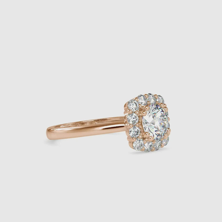 Handmade UK engagement ring with round diamond and double prong setting
