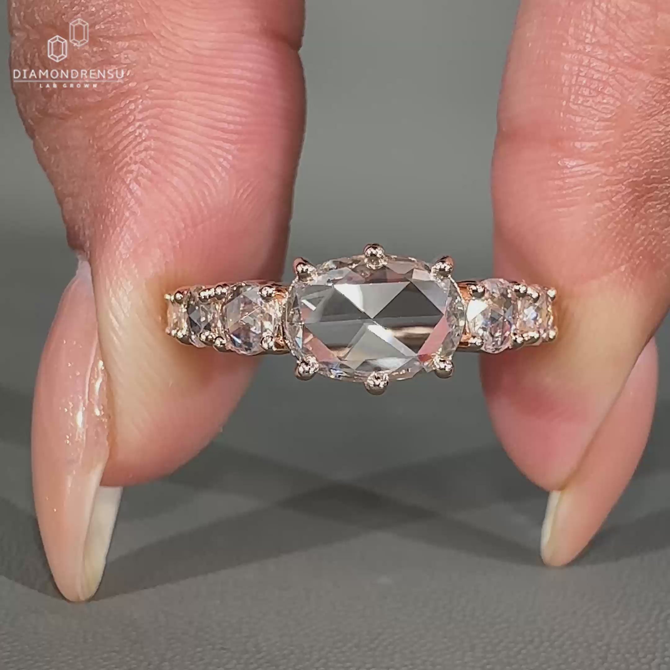 Rose cut engagement ring with tapered pave ring
