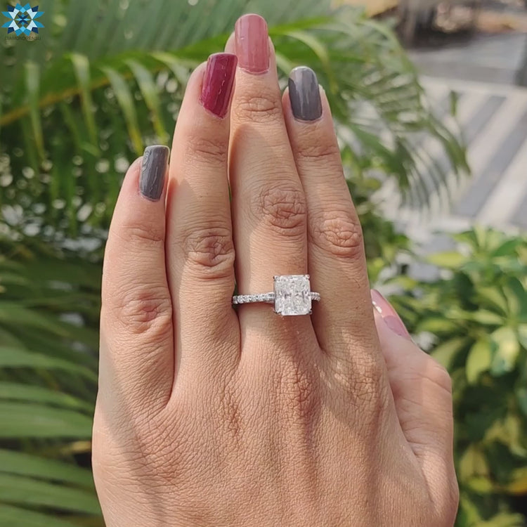 Handmade jewellery featuring radiant moissanite in 4 prong trellis setting.
