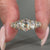 Oval rose cut centre stone set in yellow gold.
