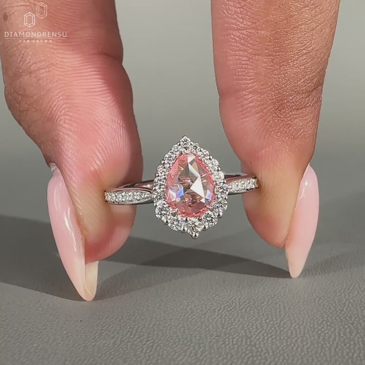 Pave setting ring with round cut halo pave in white gold.
