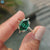 Dutch marquise moissanite ring with solitaire setting and hidden halo detail.

