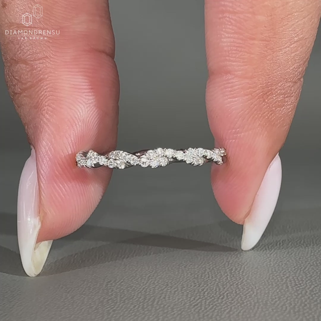 Round diamond wedding band crafted in a full eternity style.