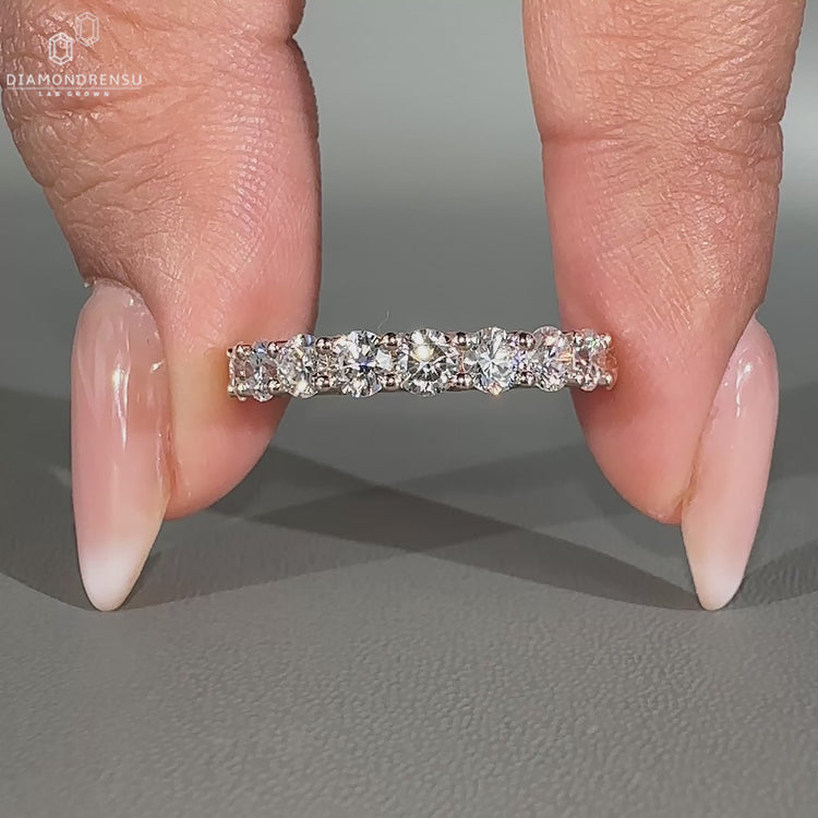 Round diamond wedding band in rose gold
