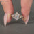 Handmade hexagon diamond ring with marquise side stones.