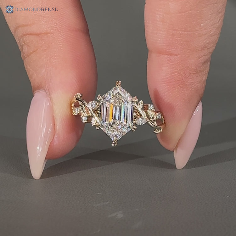 Handmade hexagon diamond ring with marquise side stones.