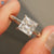 Hidden halo engagement ring with claw prong ring

